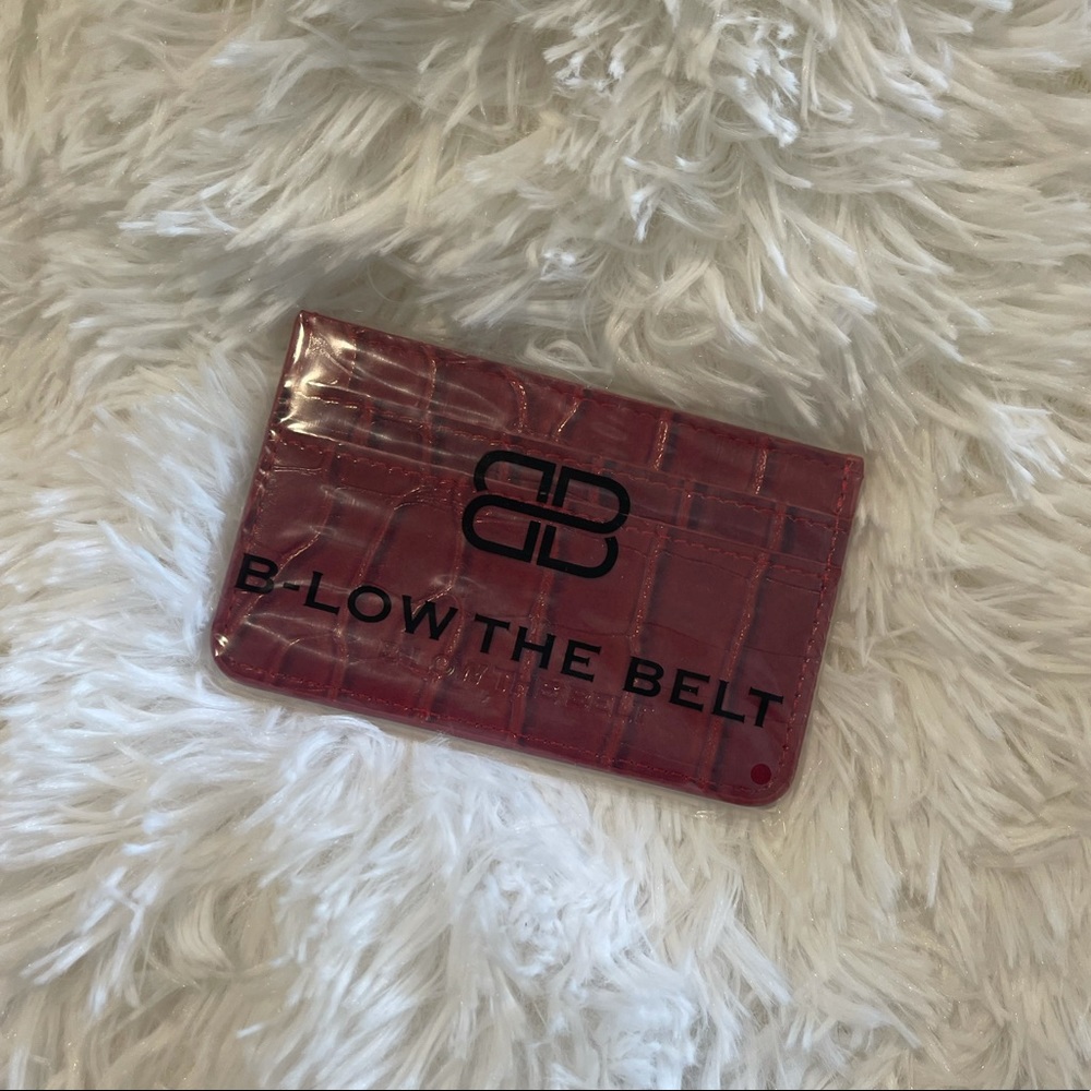 B-low the belt crocodile card case